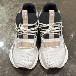 On Running Black and Cream Athletic Shoes